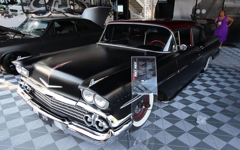 Black Classic Car — Showroom, Photograph, Woman in Purple Dress