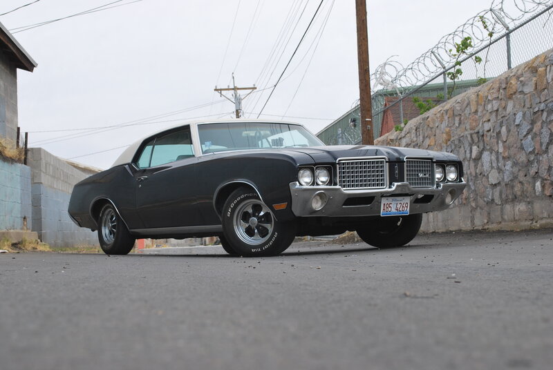 Black Classic Car — Urban, Afternoon, Photograph, Stone Wall