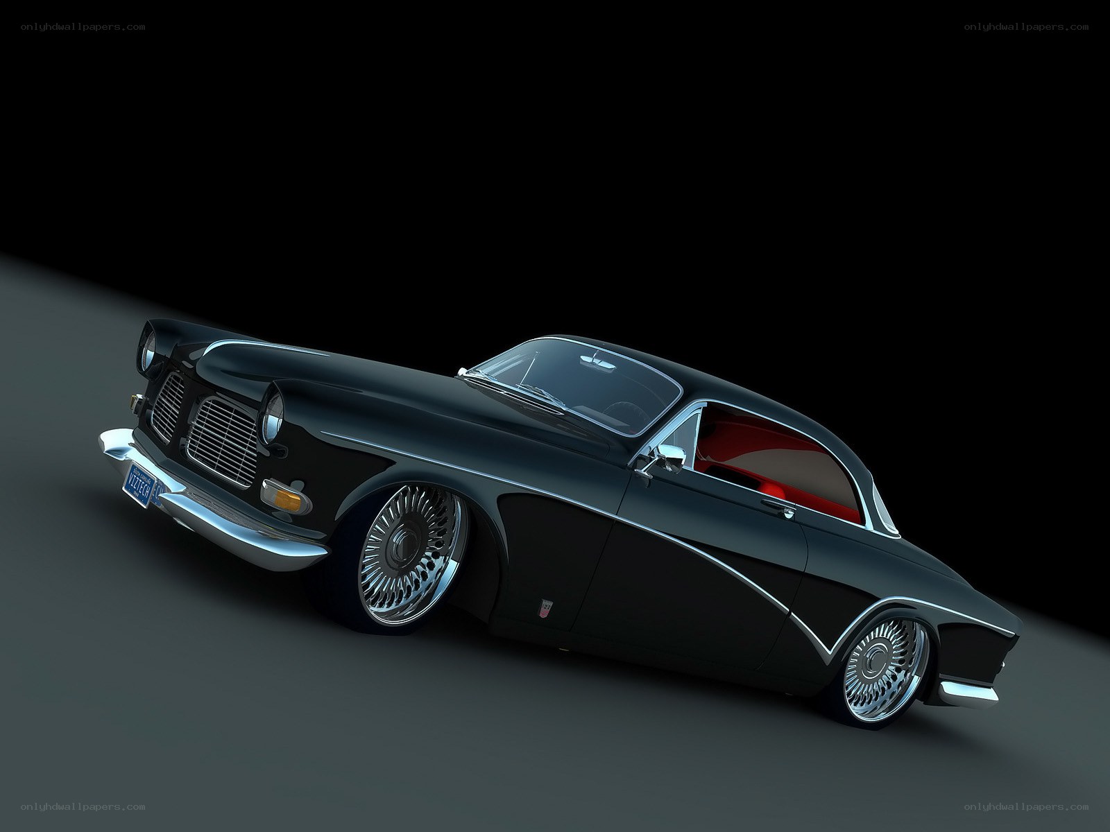 black classic car with red interior