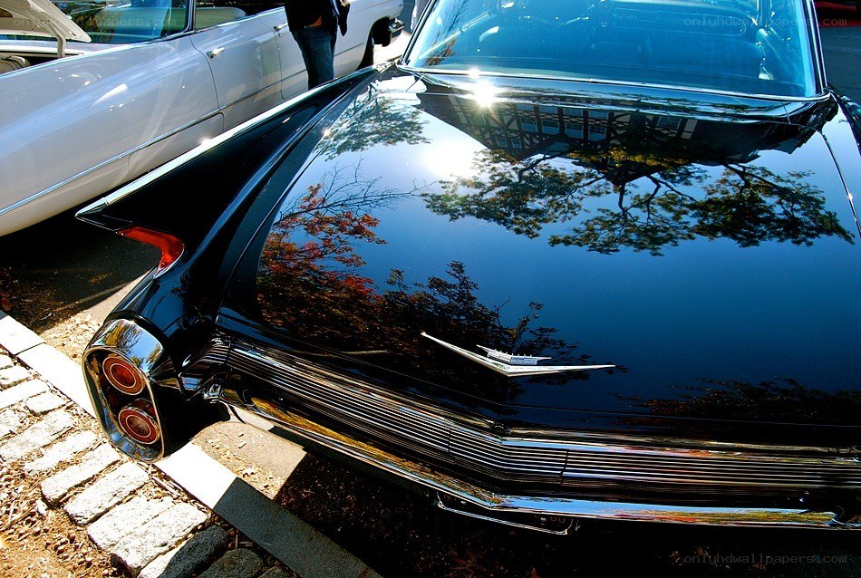 Black classic car with tailfins