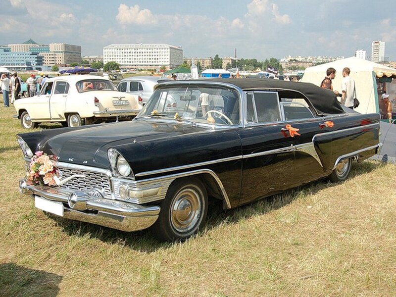 Black classic convertible at car show