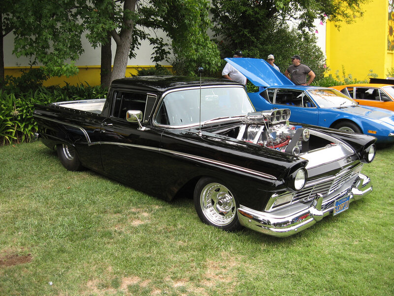 Black classic pickup truck at car show
