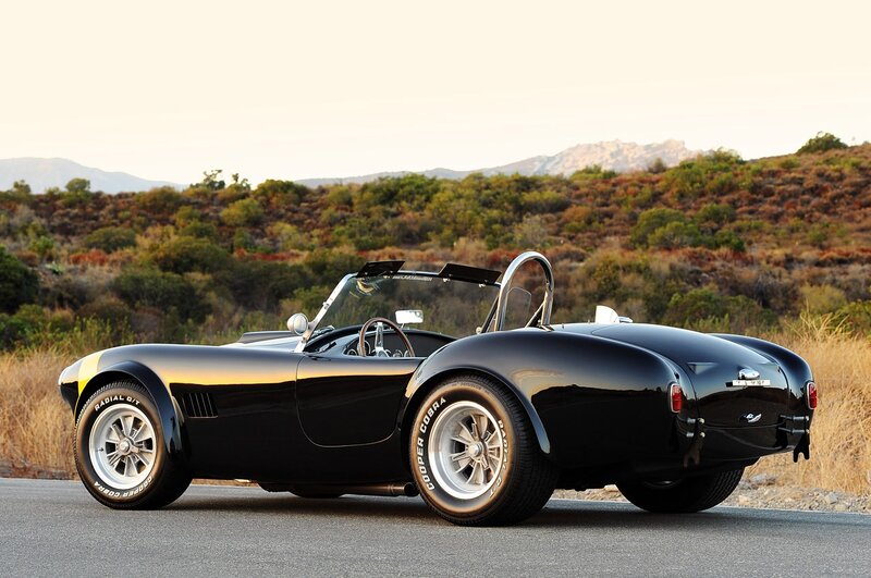 Black classic sports car on road