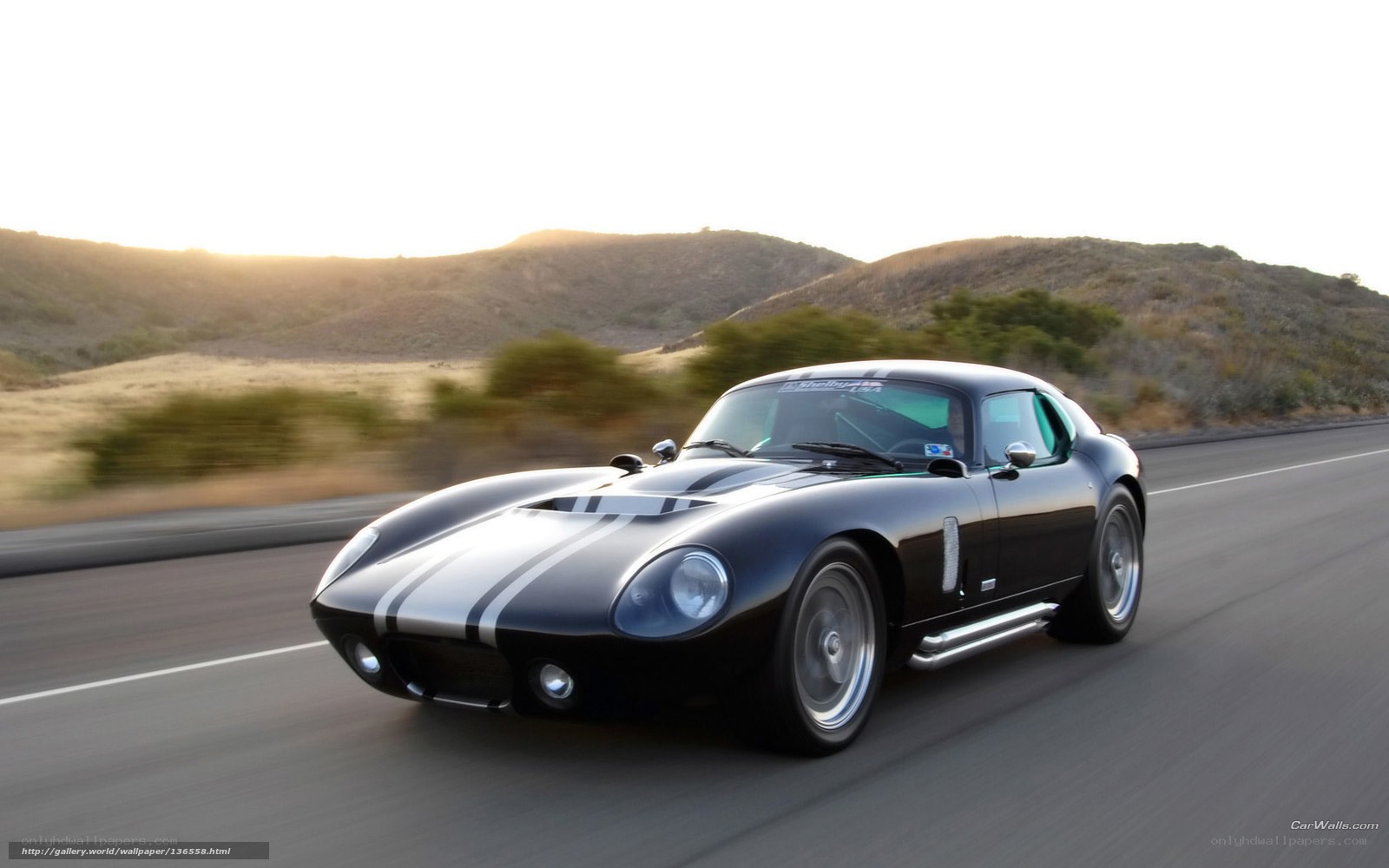 black classic sports car on road