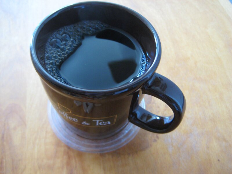 black coffee mug on table