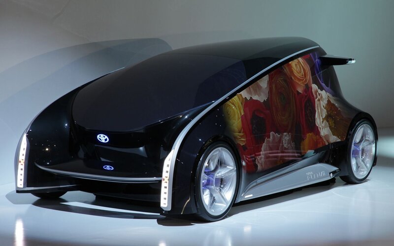 Black Concept Car — Dramatic, Photograph, Flowers