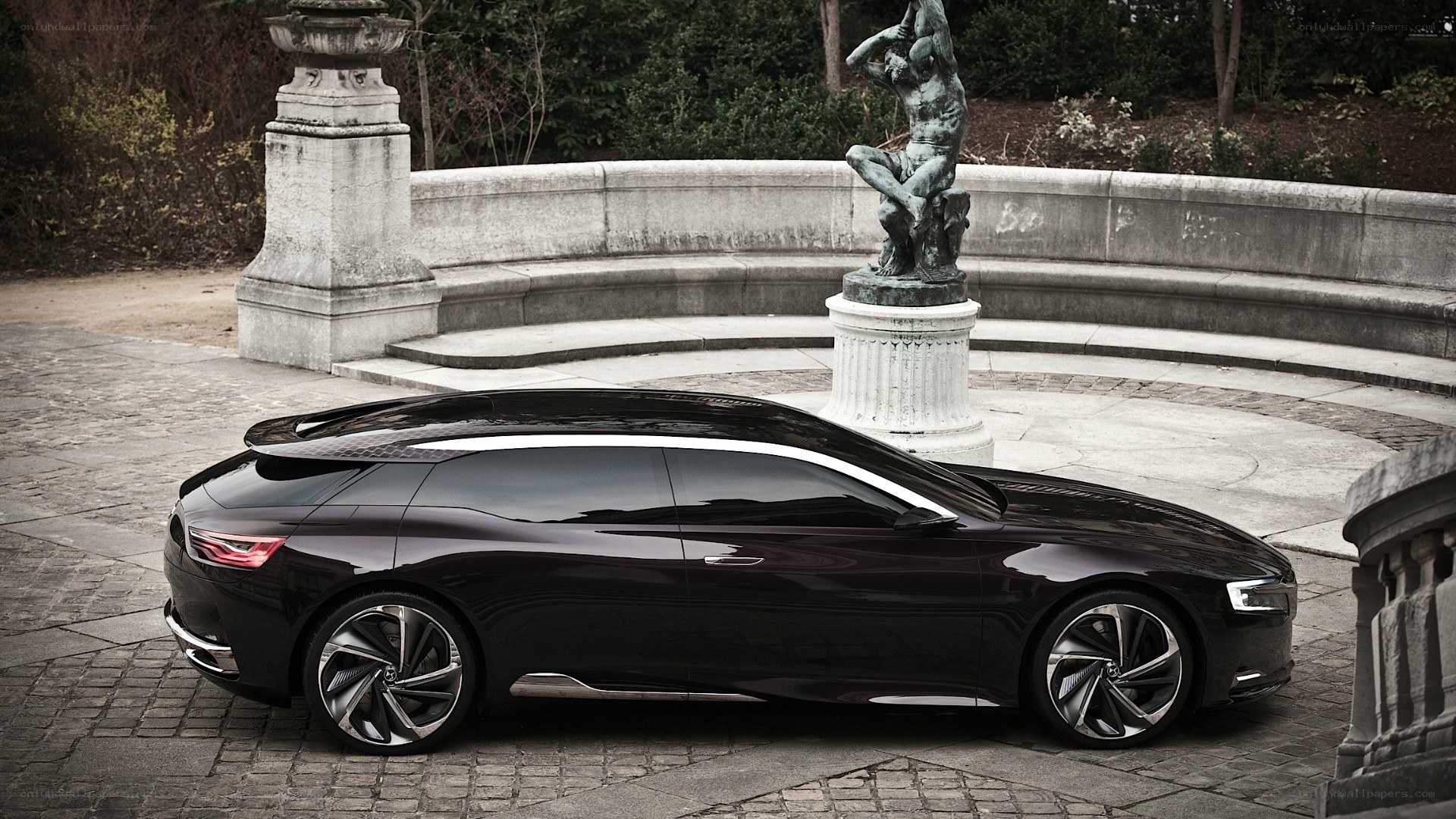 Black concept car in garden