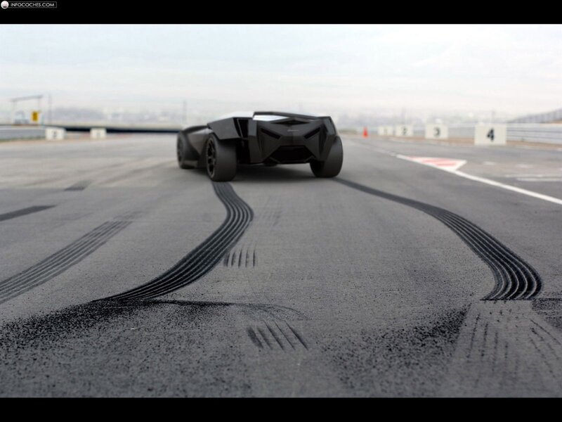 Black concept car on racetrack