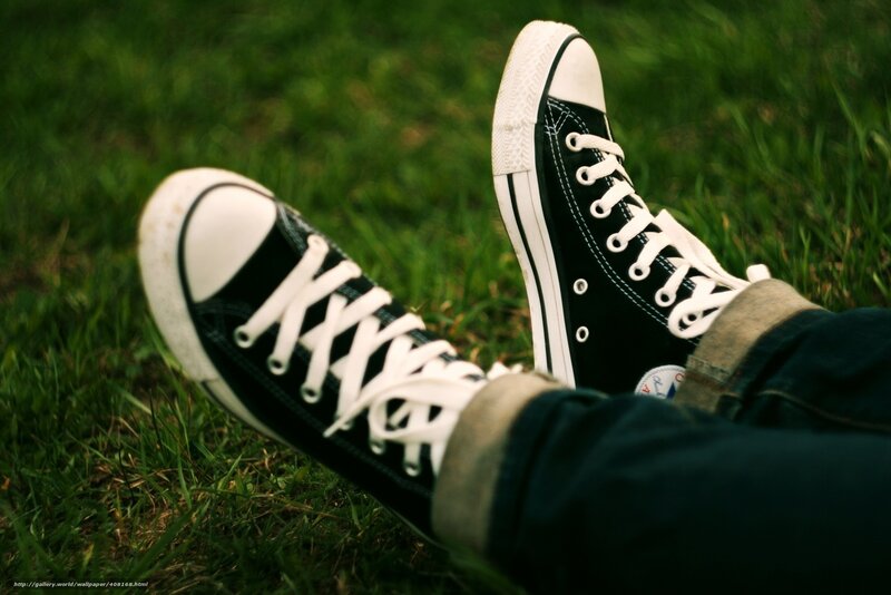 black converse on grass