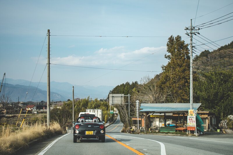 Black Convertible Car — Blue, Serene, Afternoon, Photograph, Road