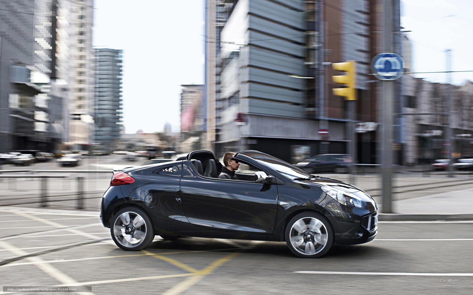 Black convertible car in city