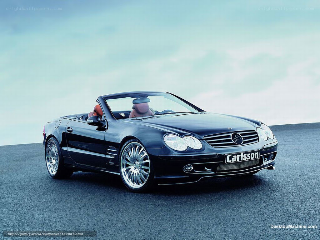 Black convertible car on road