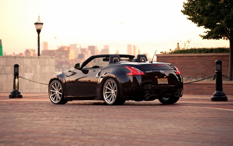 Black Convertible Car — Serene, Sunset, Photograph, City Skyline