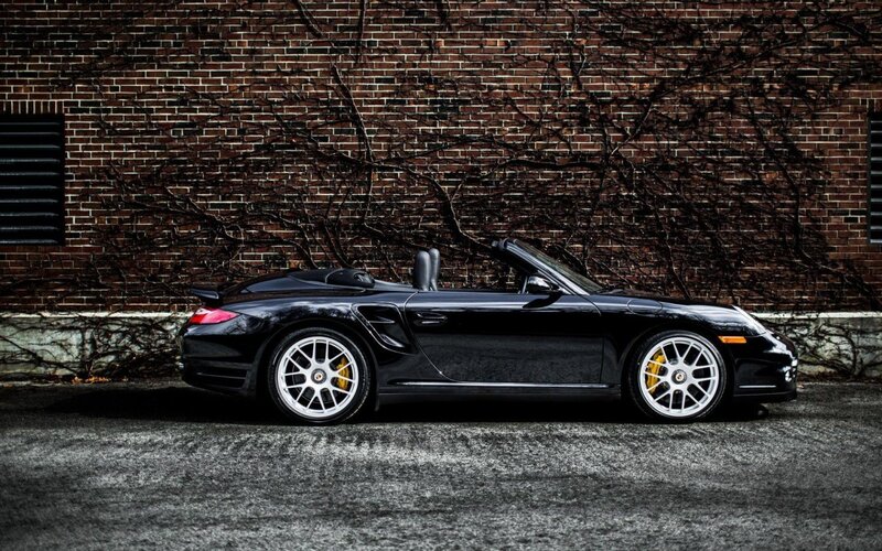 Black Convertible Sports Car — Dramatic, Photograph, Brick Wall, Vines, Asphalt