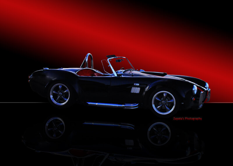 Black Convertible Sports Car — Dramatic, Photograph, Red Background, Reflection