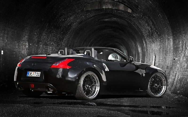 Black Convertible Sports Car — Dramatic, Photograph, Tunnel, Brick Wall