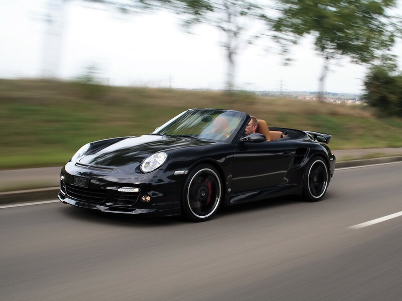 black convertible sports car in motion