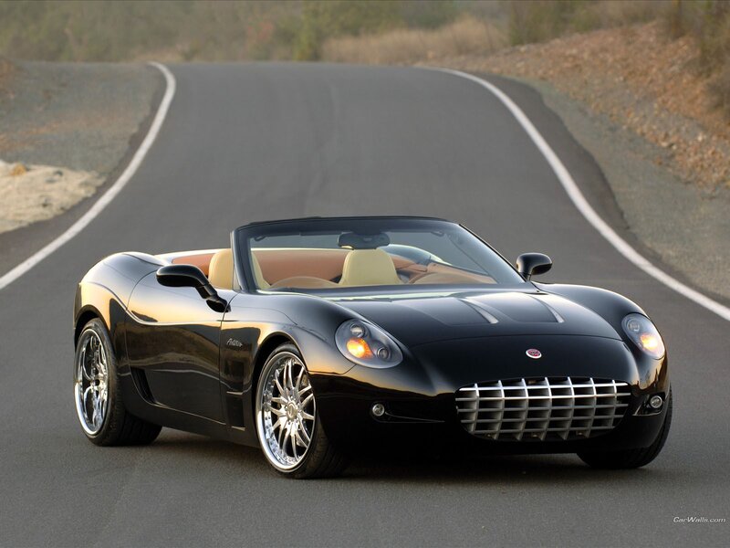 Black convertible sports car on road
