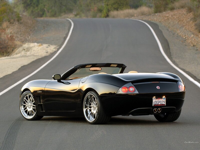Black convertible sports car on road