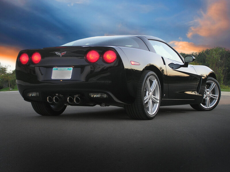 Black Corvette at sunset