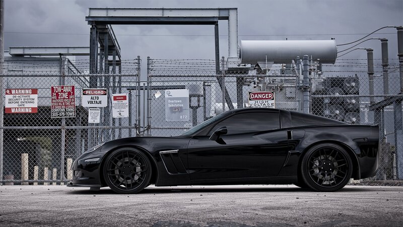 Black Corvette Car — Dramatic, Photograph, Fence, Substation