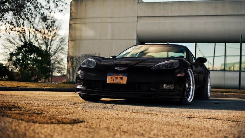 Black Corvette Car — Dramatic, Sunset, Photograph, Building