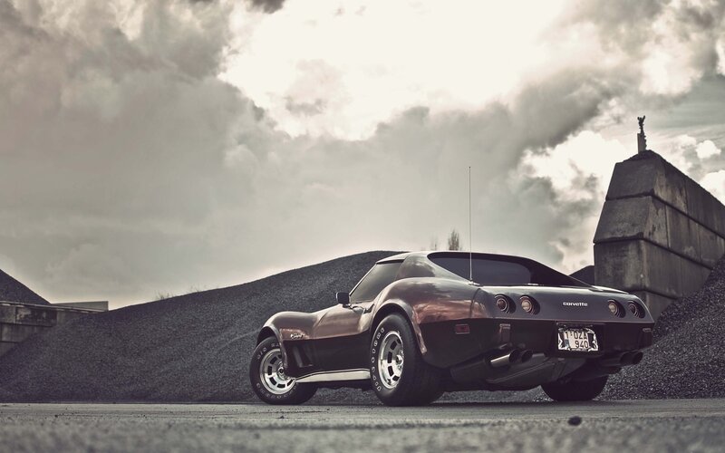 Black Corvette Car — Gray, Dramatic, Photograph, Gravel Pile