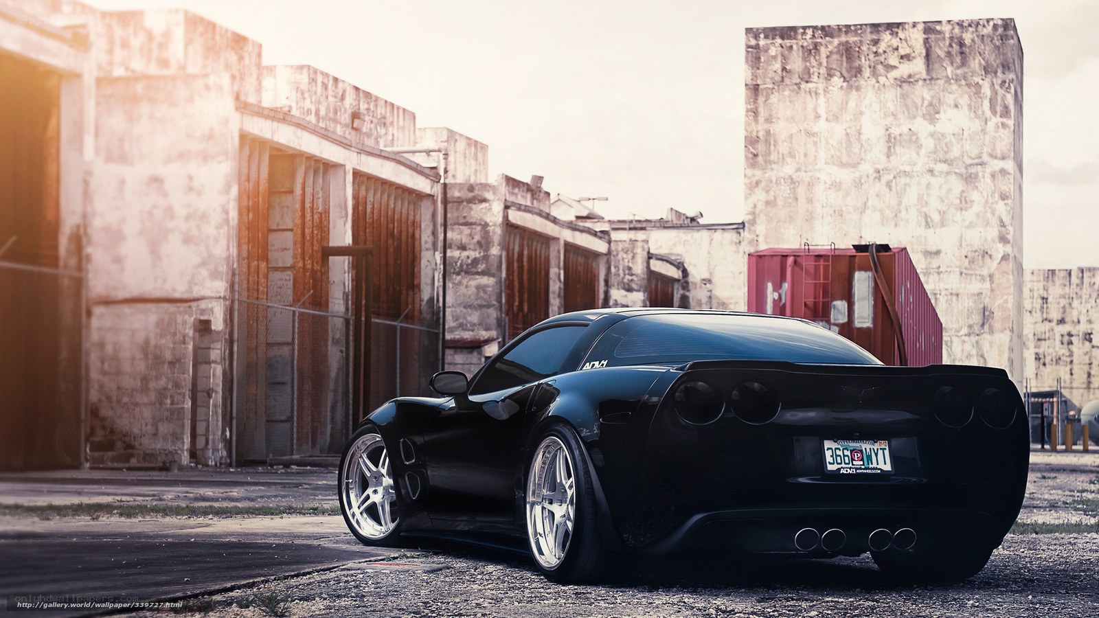 black corvette in industrial lot