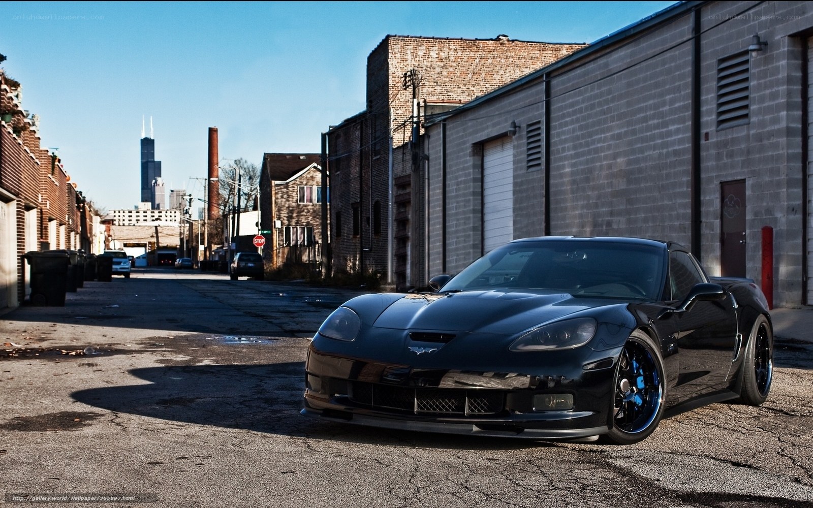 Black Corvette in urban alley