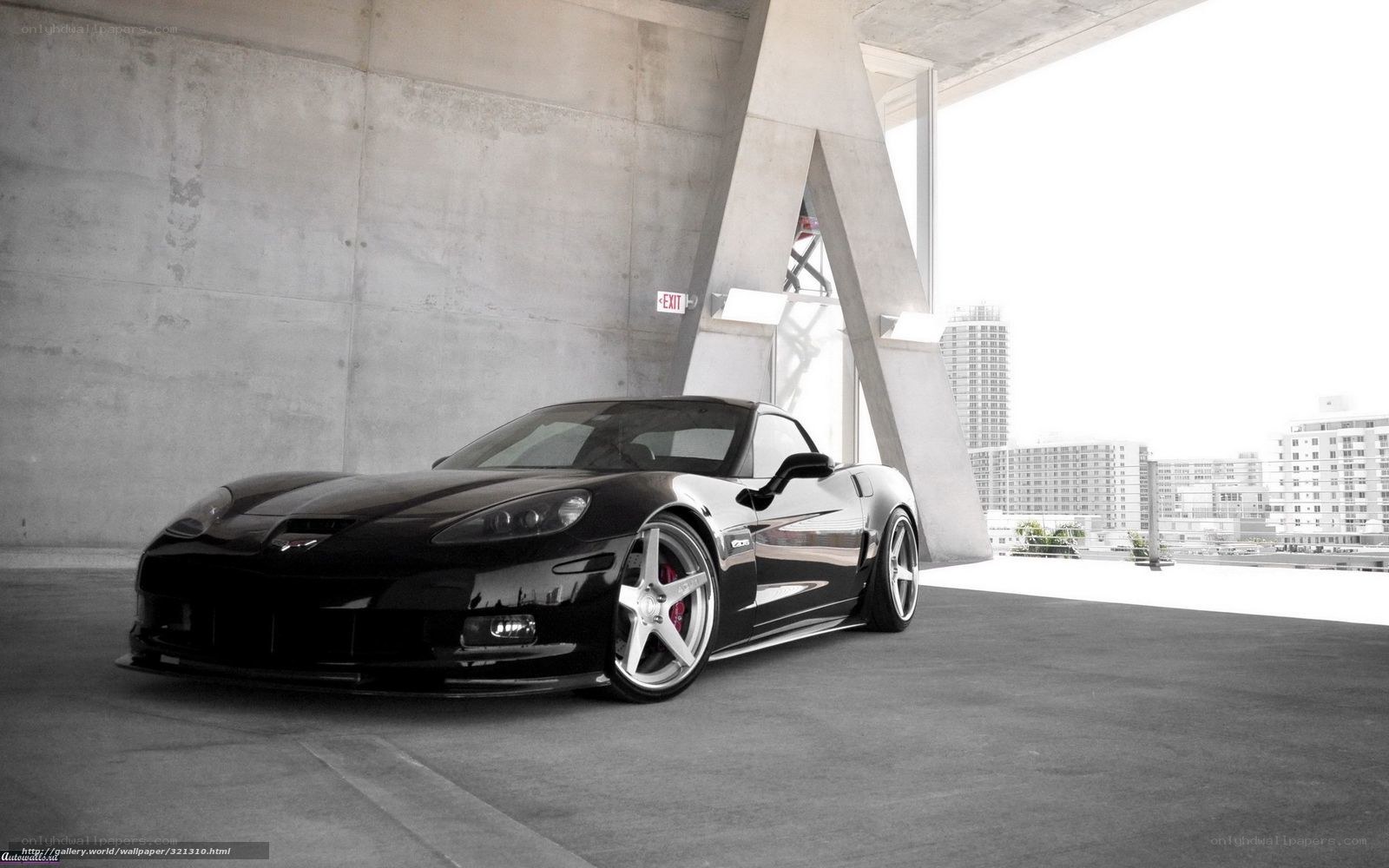 Black Corvette in urban setting