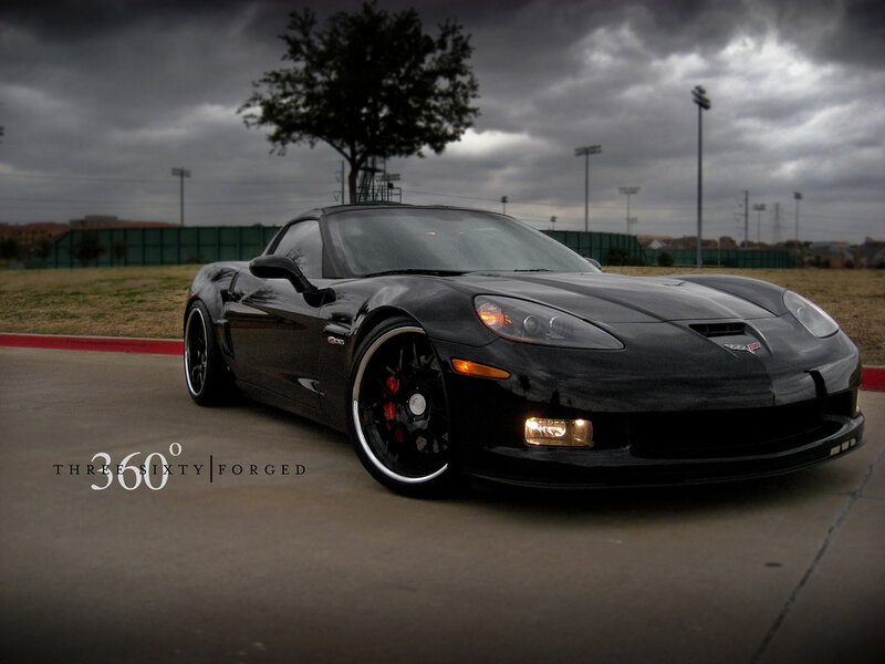 Black Corvette on a cloudy day