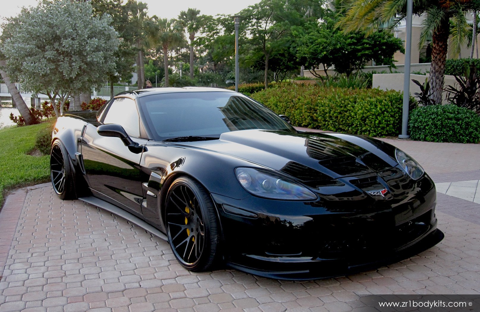 Black Corvette on a driveway