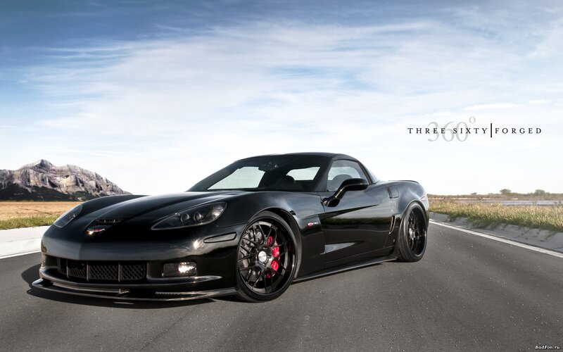 Black Corvette on a road
