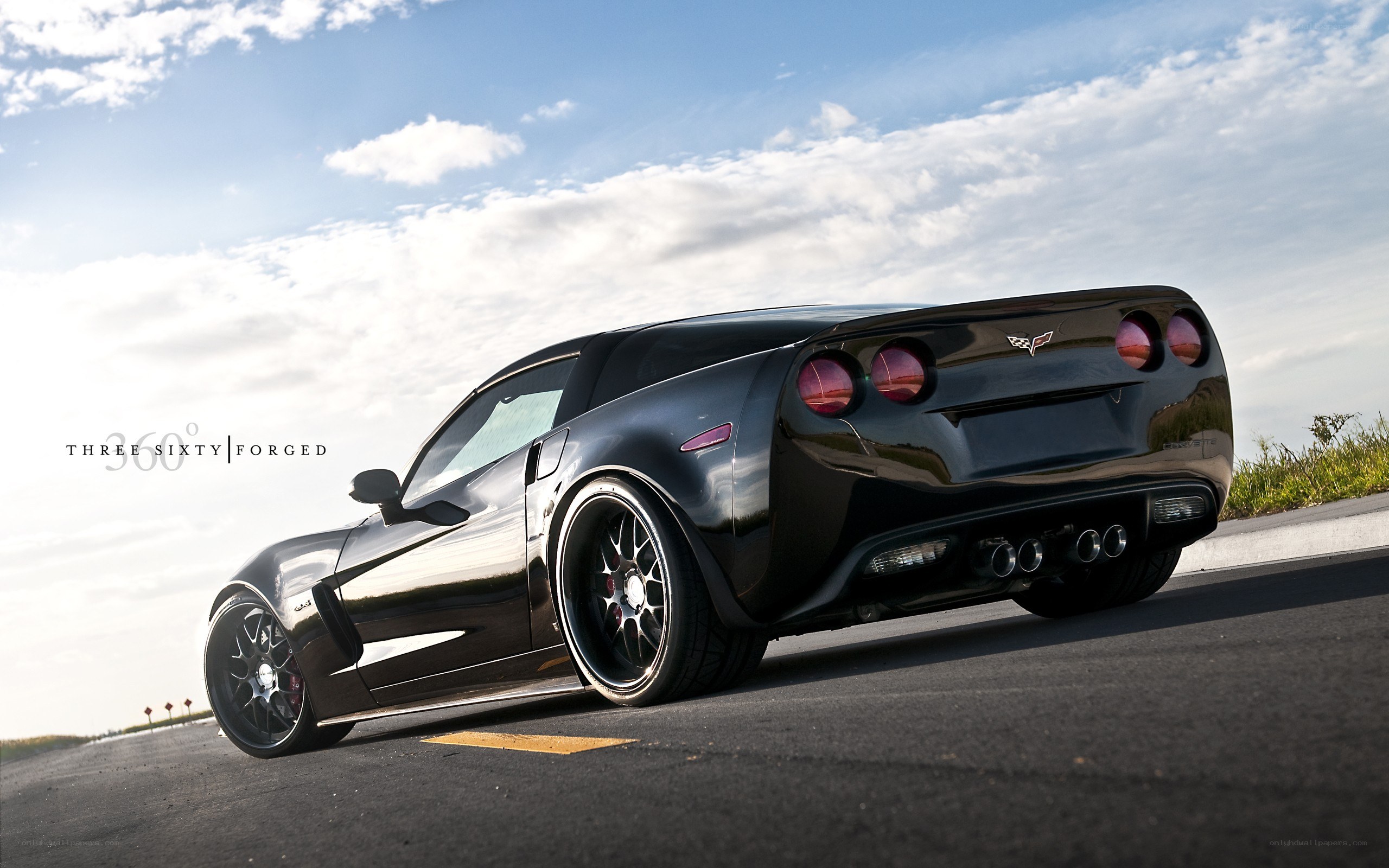 Black Corvette on a road