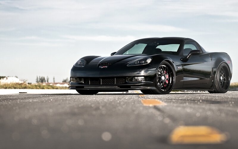 Black Corvette on a runway