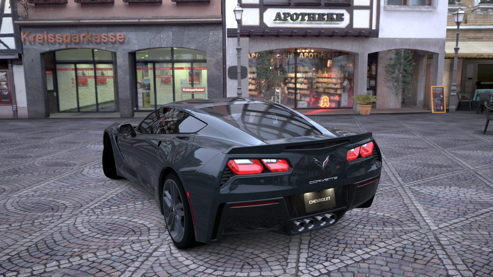 Black Corvette on cobblestone street