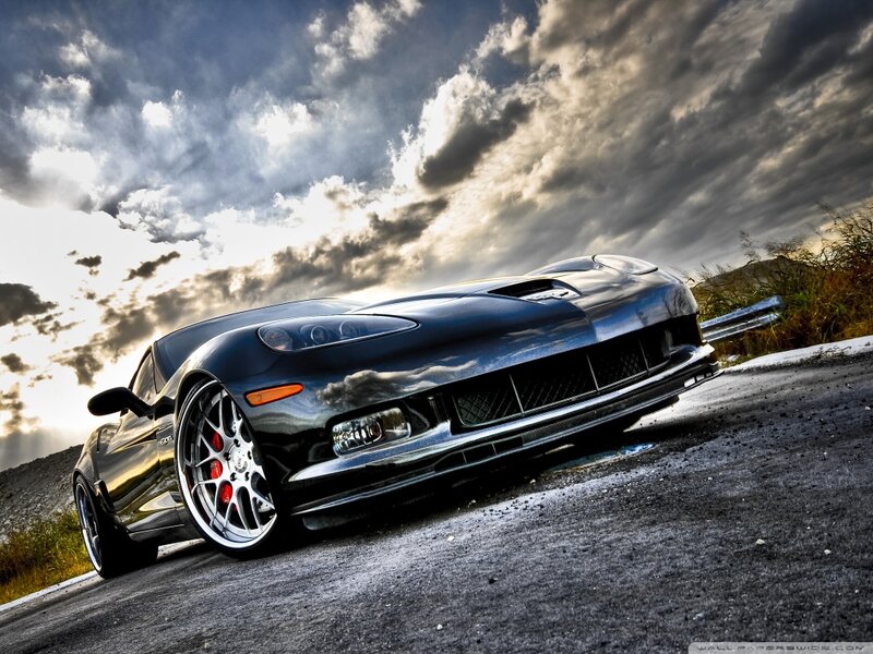 Black Corvette on Road — Dramatic, Sunset, Photograph, Clouds