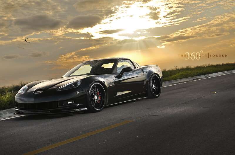 Black Corvette on Road — Dramatic, Sunset, Photograph