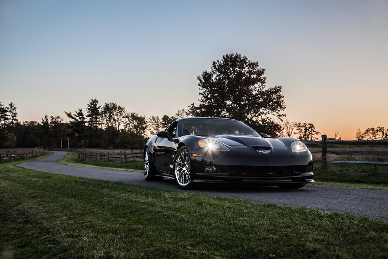 Black Corvette on Road — Green