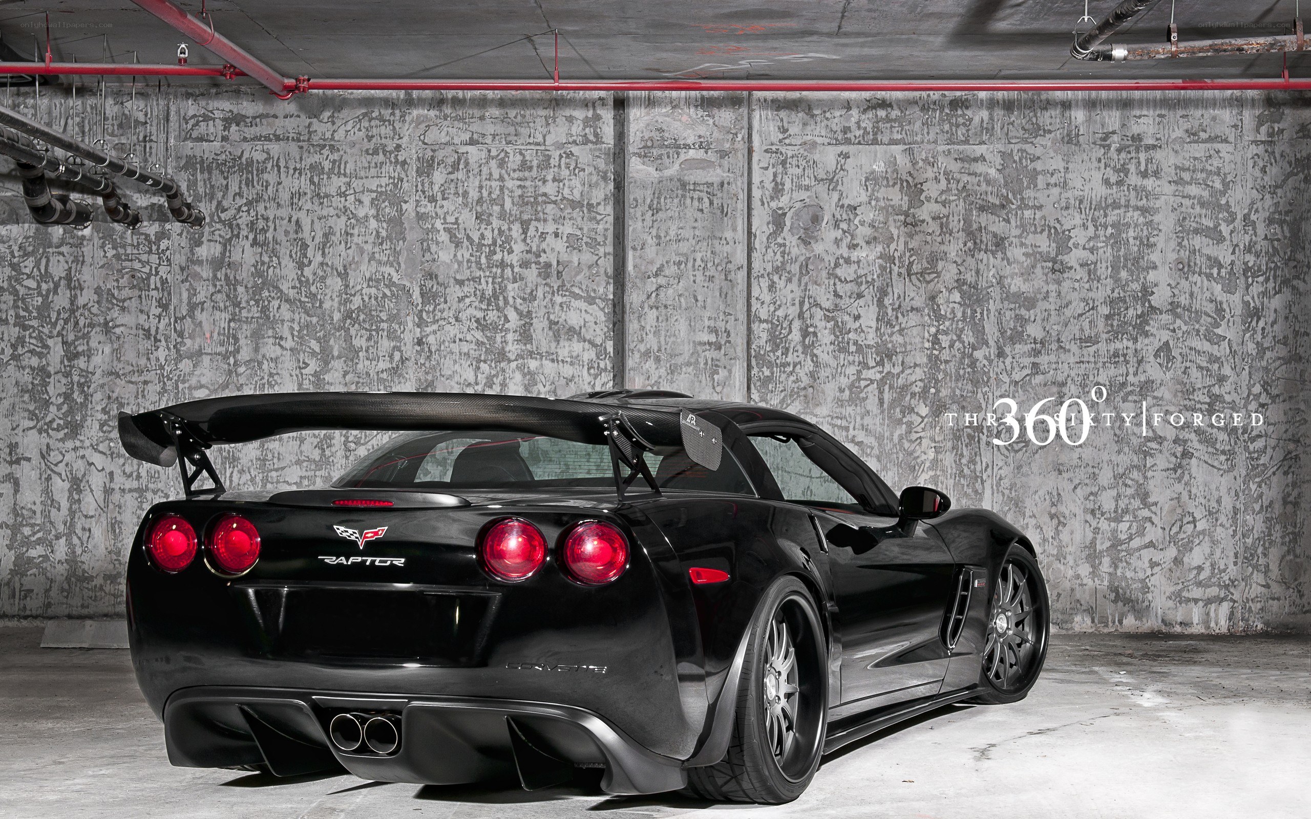 Black Corvette Raptor in garage