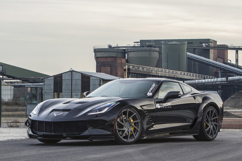 Black Corvette Sports Car — Dramatic, Afternoon, Photograph, Industrial Buildings