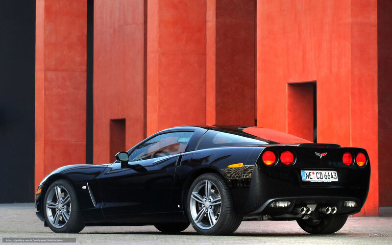 Black Corvette Sports Car — Dramatic, Photograph, Red Wall