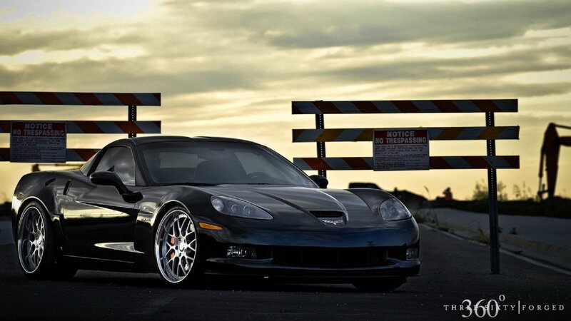 Black Corvette Sports Car — Dramatic, Sunset, Photograph, Barrier Gates