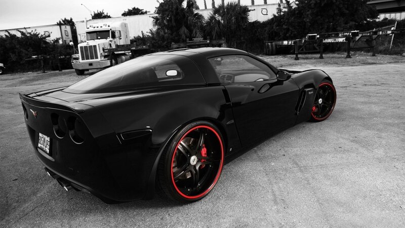 Black Corvette with Red Rims — Dramatic