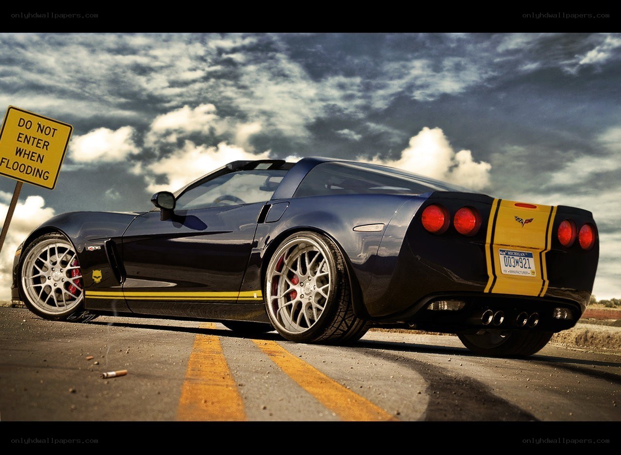 Black Corvette with yellow stripes
