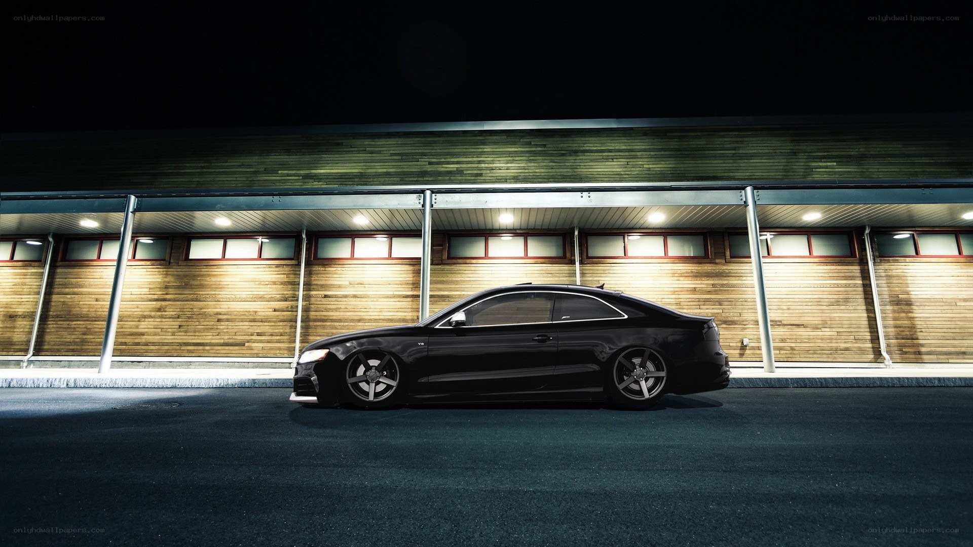 black coupe at night