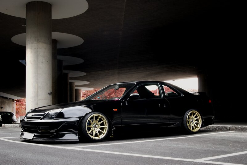 Black Coupe Car — Dramatic, Afternoon, Photograph, Gold Wheels