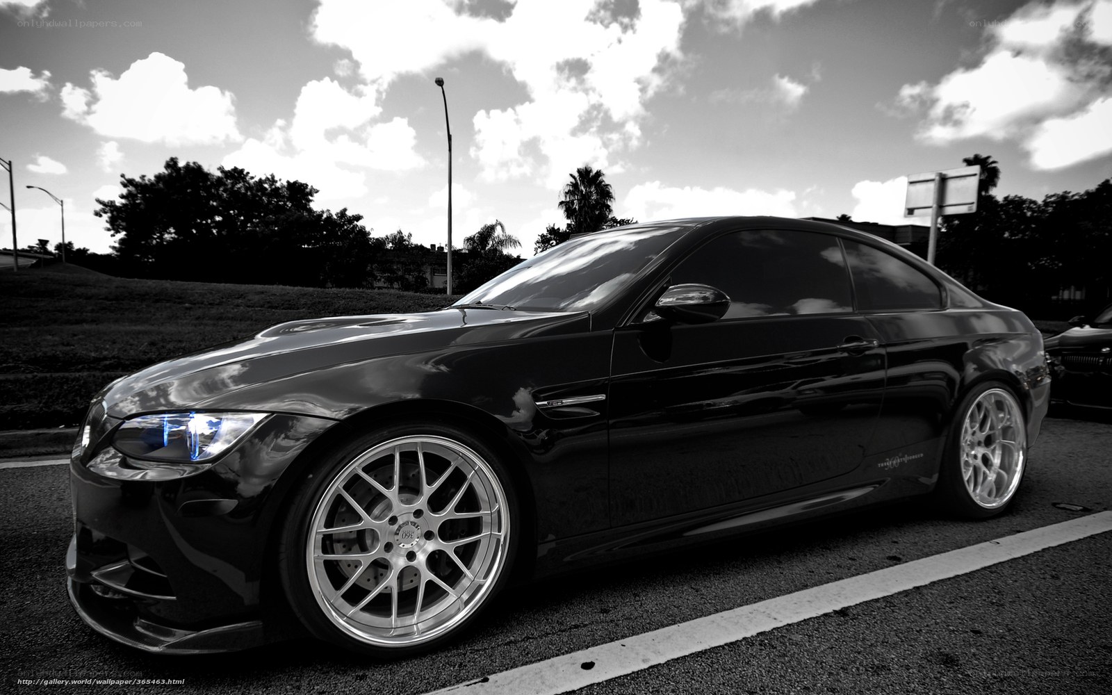 black coupe car in parking lot
