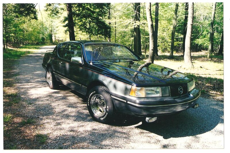 Black Coupe Car — Serene, Afternoon