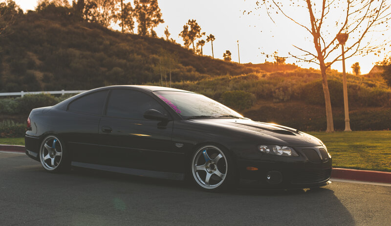 Black Coupe Car — Serene, Sunset, Photograph, Tree